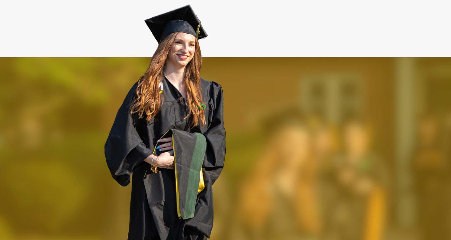 A student graduates with an MAT from MU